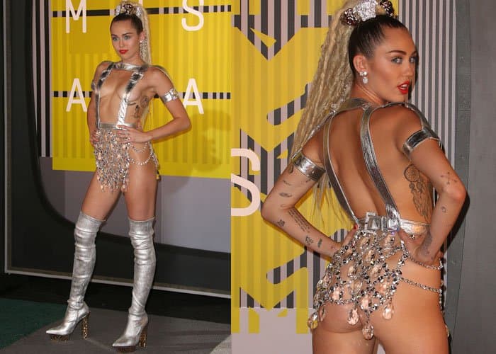 Miley Cyrus rocked a crystal-effect miniskirt and two silver straps covering her chest, which left little to the imagination