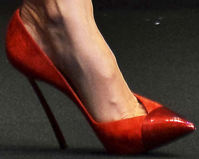 Miranda Kerr shows off her feet in red cap-toe Candylux pumps