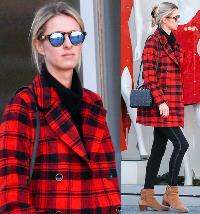 Nicky Hilton hides her eyes behind a mirrored pair of Illesteva sunglasses