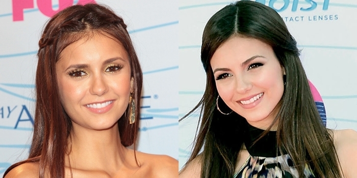 Nina Dobrev and Victoria Justice, often mistaken for sisters due to their striking resemblance, share a moment at the 2012 Teen Choice Awards