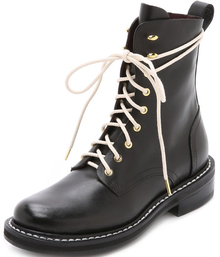 Rag & Bone boots in a classic combat style, crafted in sturdy leather and fastened with a lace-up closure