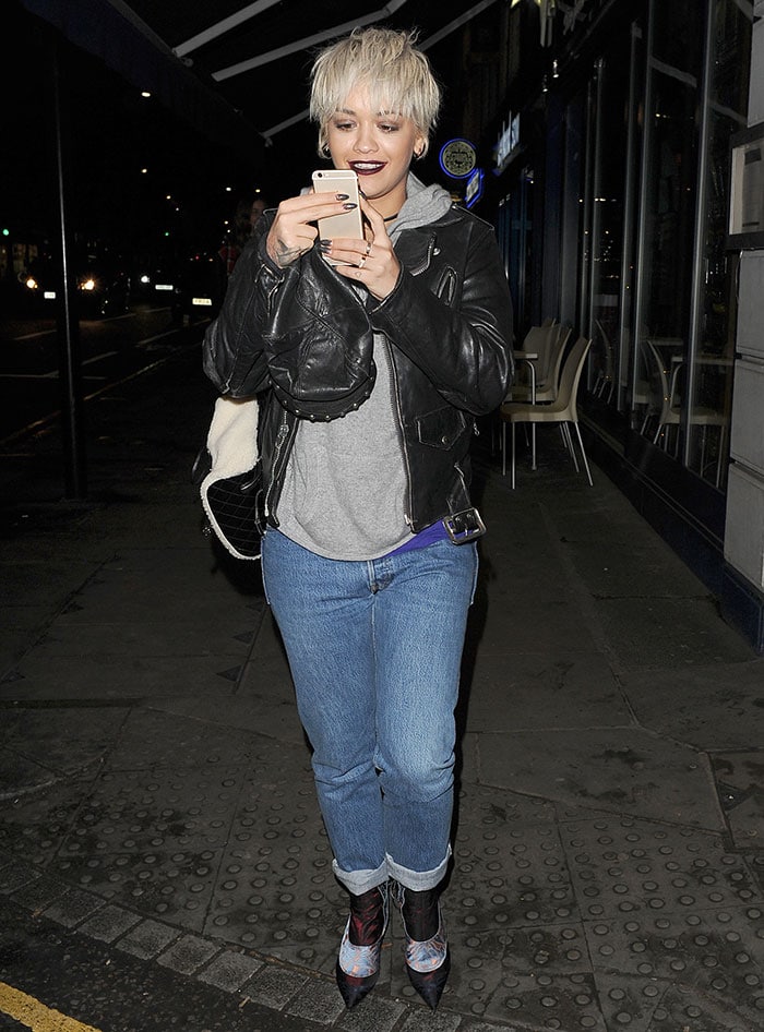 Rita Ora wears a layered ensemble while out for late-night pizza in London