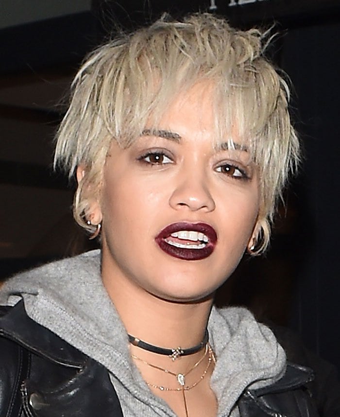Rita Ora debuts a new pixie hairstyle on a night out at London's Pizza Express with her sister and friends