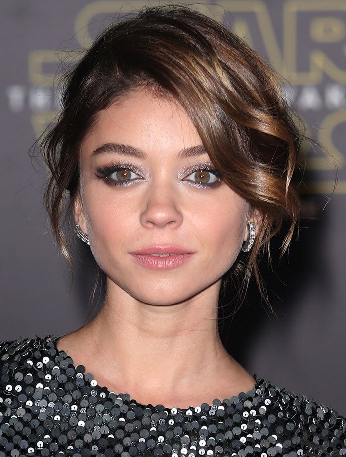 Sarah Hyland rounded out her look with a messy — but chic — updo, and gorgeous makeup