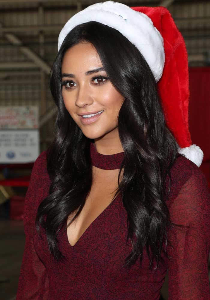 Shay Mitchell celebrates Christmas in a cute Santa Claus hat