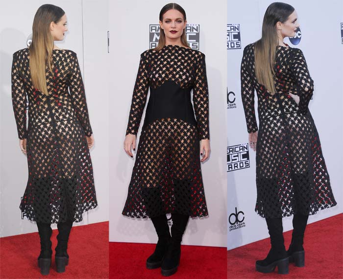 Tove Lo wears a nude thong and pasties underneath a black mesh dress on the red carpet