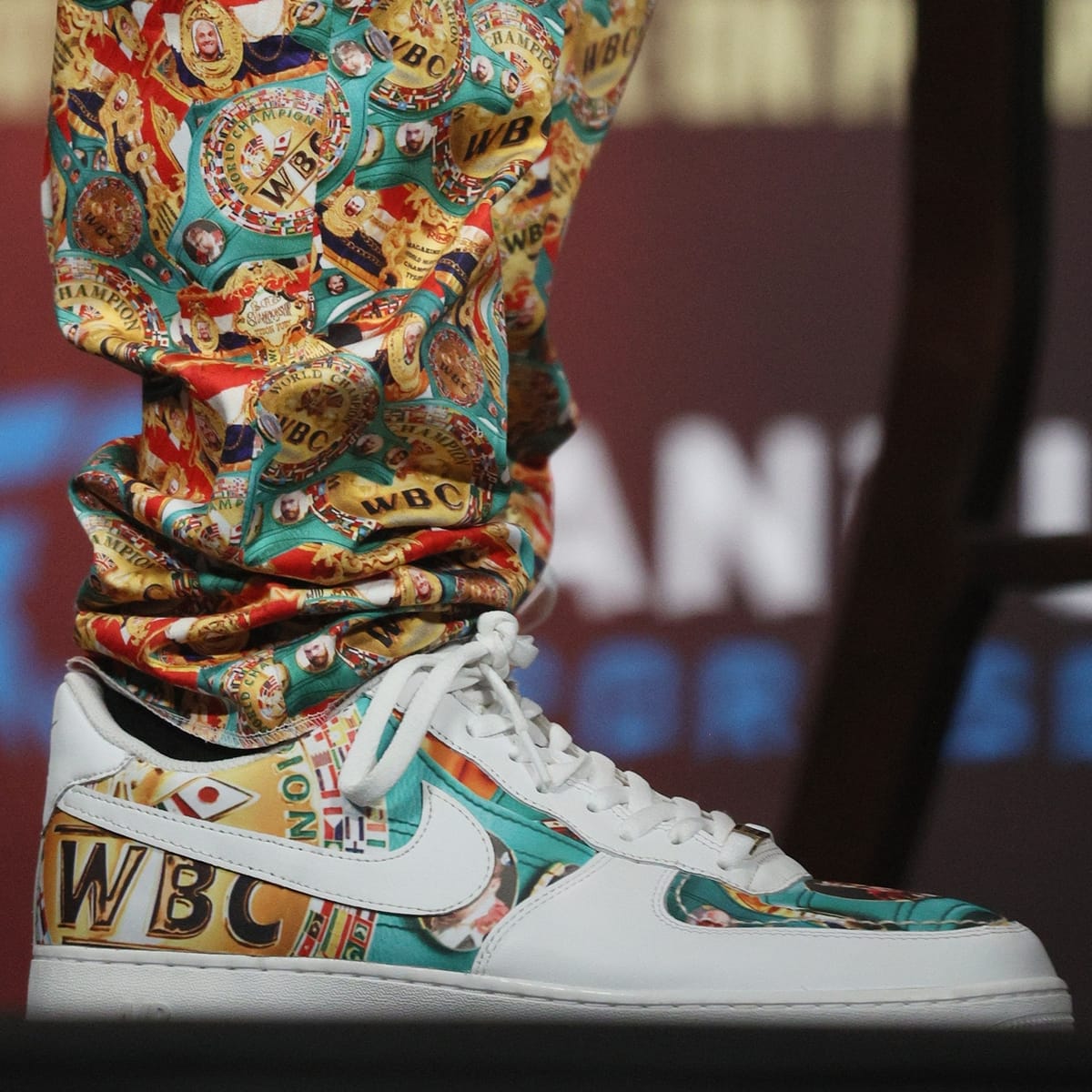 Tyson Fury shows off his size 14 (US) custom Nike Air Force WBC champion shoes