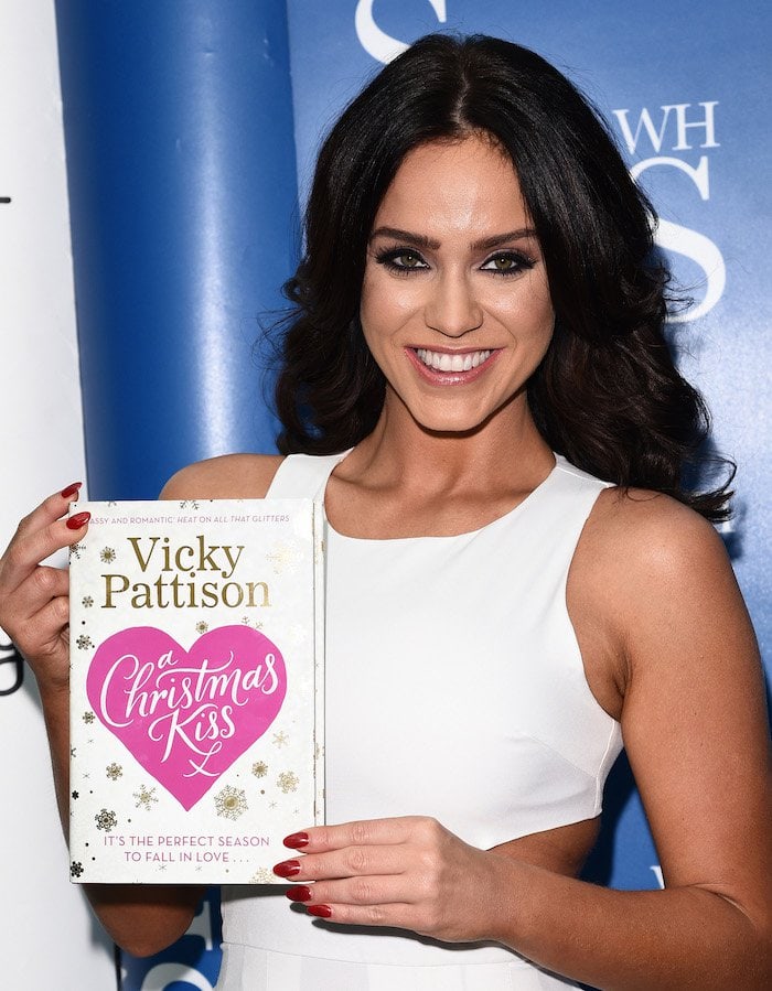 Vicky Pattison poses with her book "A Christmas Kiss"