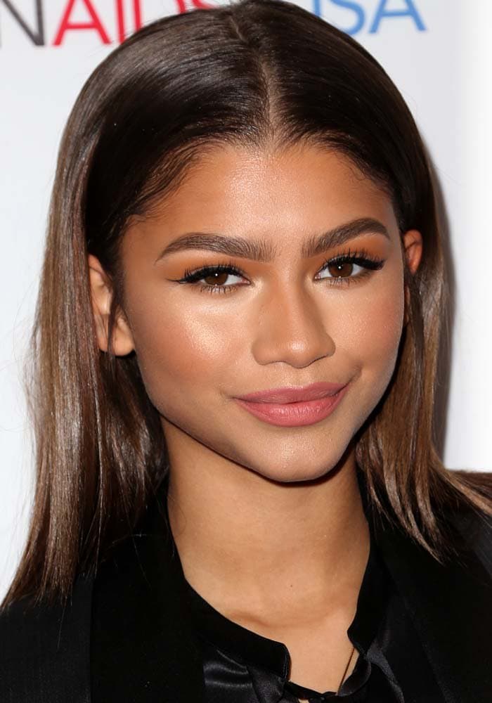 Zendaya wears her hair down at the inaugural World AIDS Day Benefit presented by UnAIDS