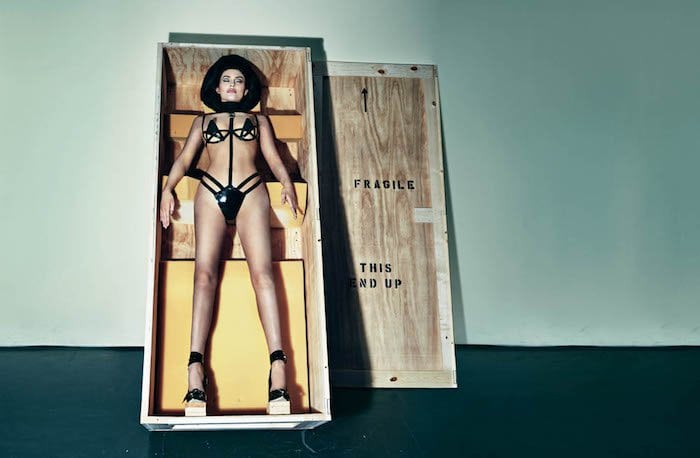 Kylie Jenner wears a Chromat cutout bra and a Dawnamatrix harness for a photoshoot