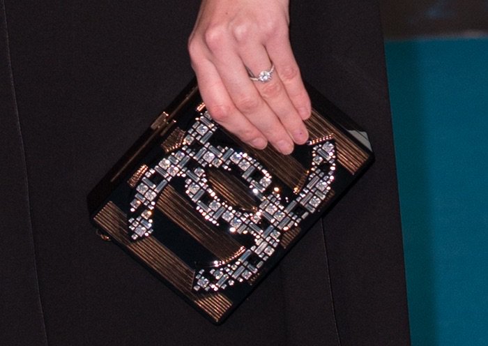 Kaya Scodelario shows off her engagement ring and a Chanel clutch