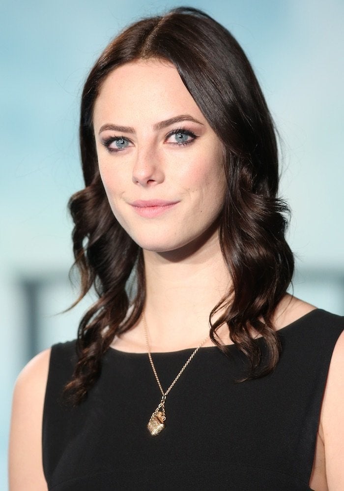 Kaya Scodelario wears her hair down at the UK premiere of "In the Heart of the Sea" held December 2, 2015, at Leicester Square in London