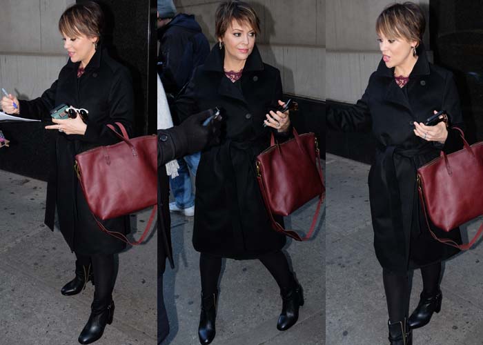 Alyssa Milano wears a black coat and signs autographs as she leaves "The Wendy Williams Show"