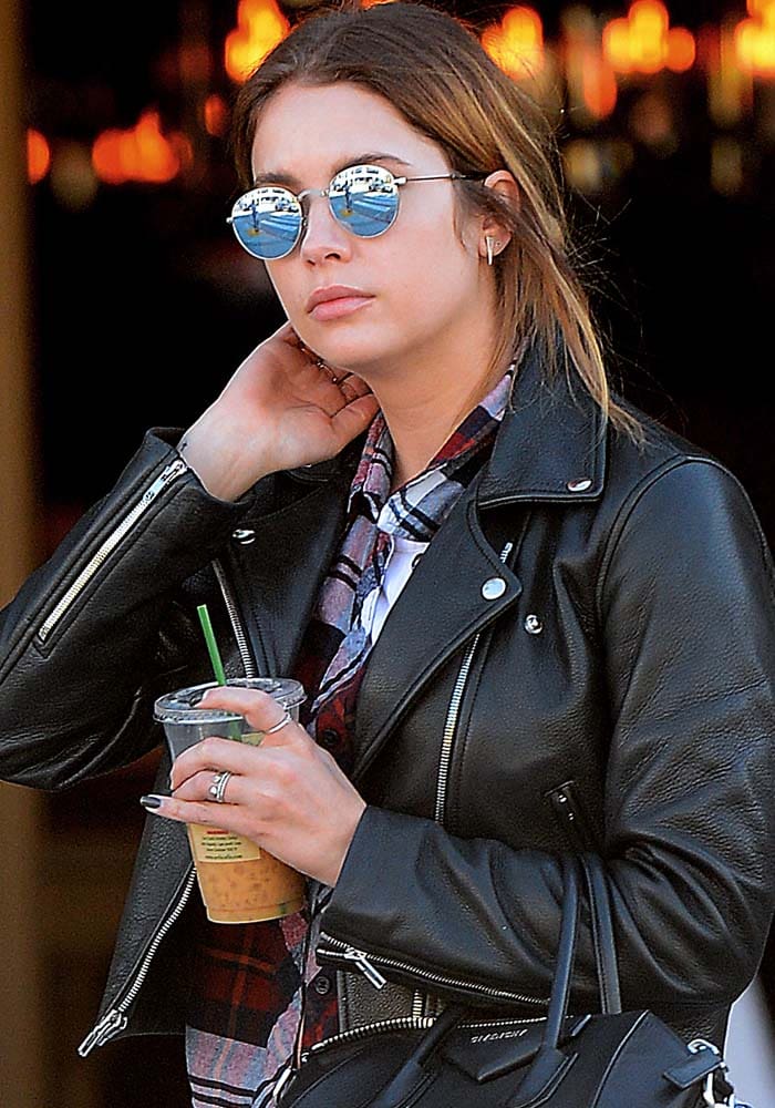 Ashley Benson wears her hair in a messy bun as she leaves Urth Cafe