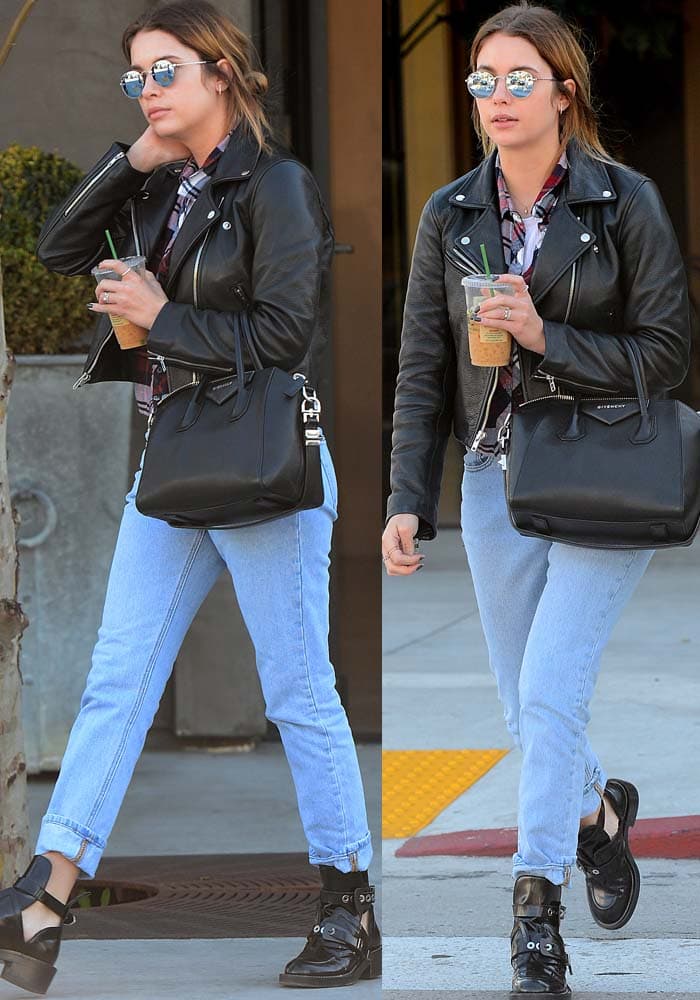 Ashley Benson wears a leather jacket and baggy jeans as she leaves a coffee shop