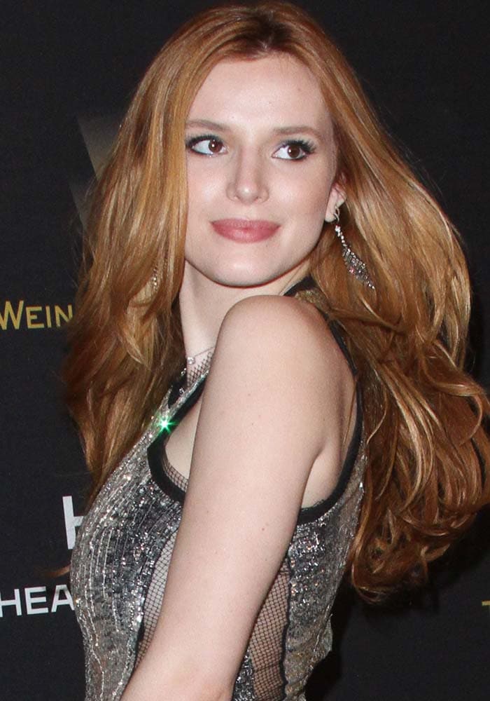 Bella Thorne wears her red hair down at the Weinstein Company & Netflix 2016 Golden Globe After Party