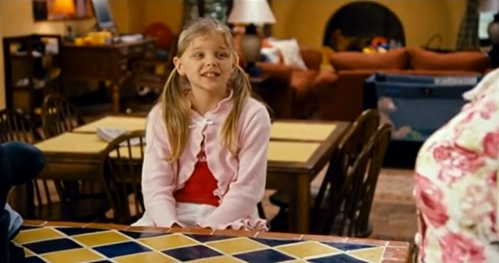 Chloë Grace Moretz as Carrie Fuller, the sweet and curious daughter in Big Momma's House 2, during a scene where she interacts with Big Momma