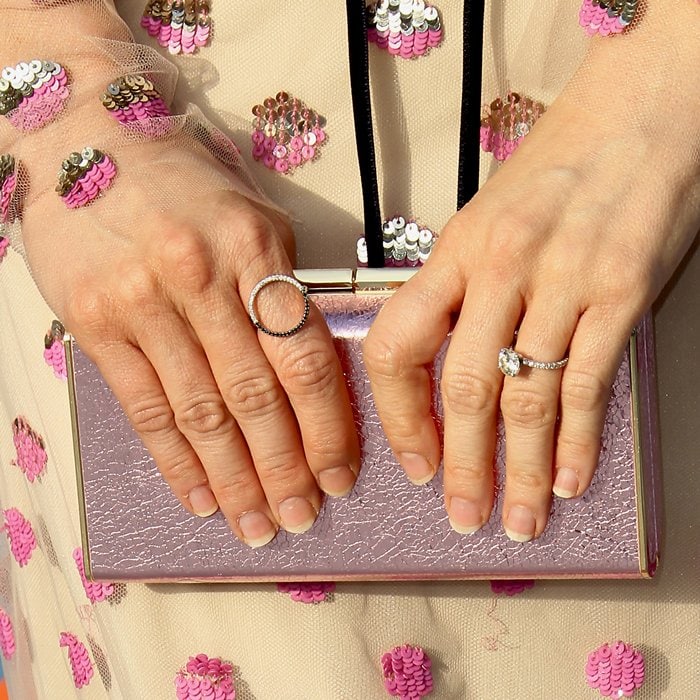Brittany Snow's hands and pink Kate Spade New York ‘Sam’ box clutch