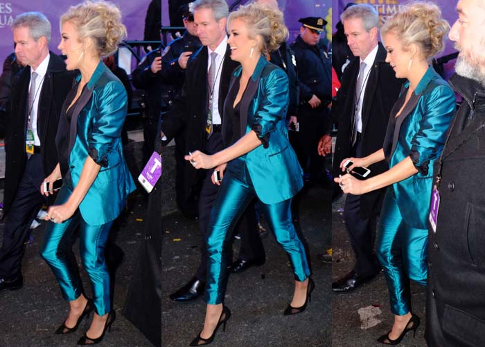 Carrie Underwood wears a metallic blue suit for New Year's Eve