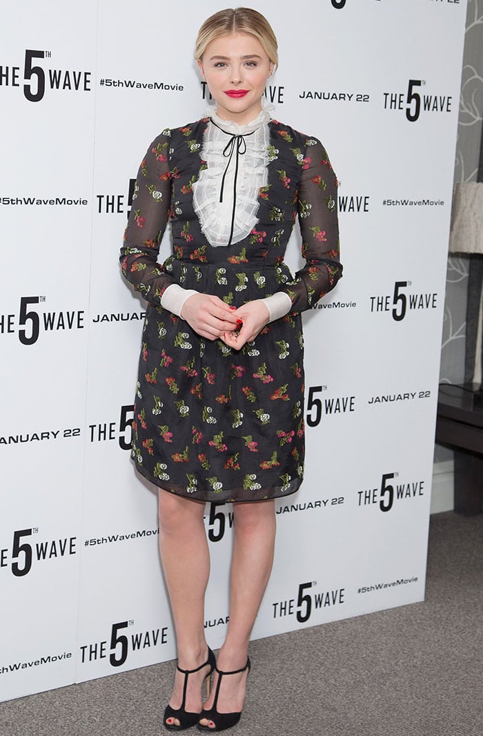 Chloe Moretz poses for photos in a floral-print Erdem dress