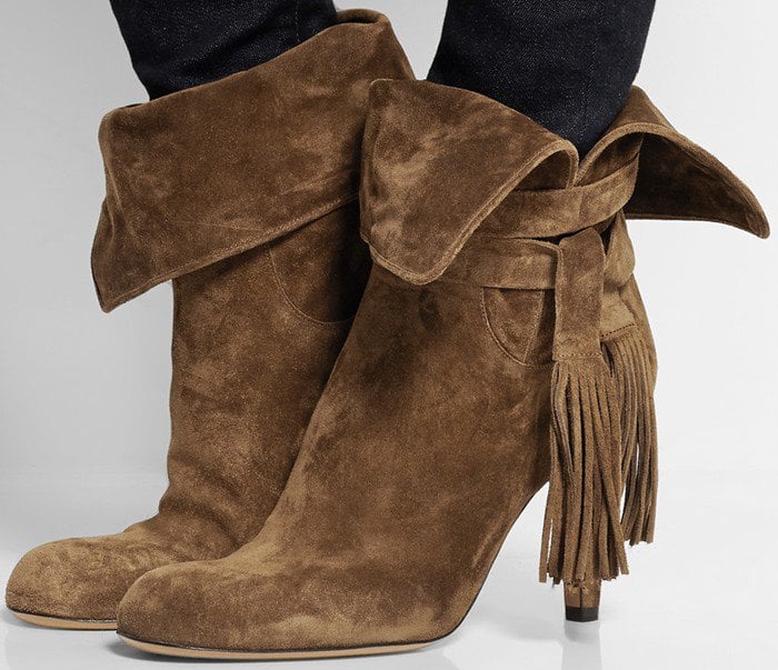 Chloé's slouchy ankle boots are crafted in Italy from supple chocolate suede and feature folded cuffs and cool, wrap-around tassels
