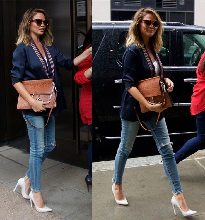 Chrissy Teigen flaunts her incredible legs in jeans