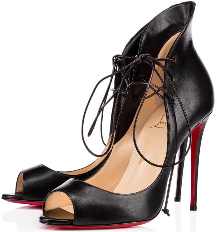 Christian Louboutin leather pump featuring a raised heel counter and a red sole