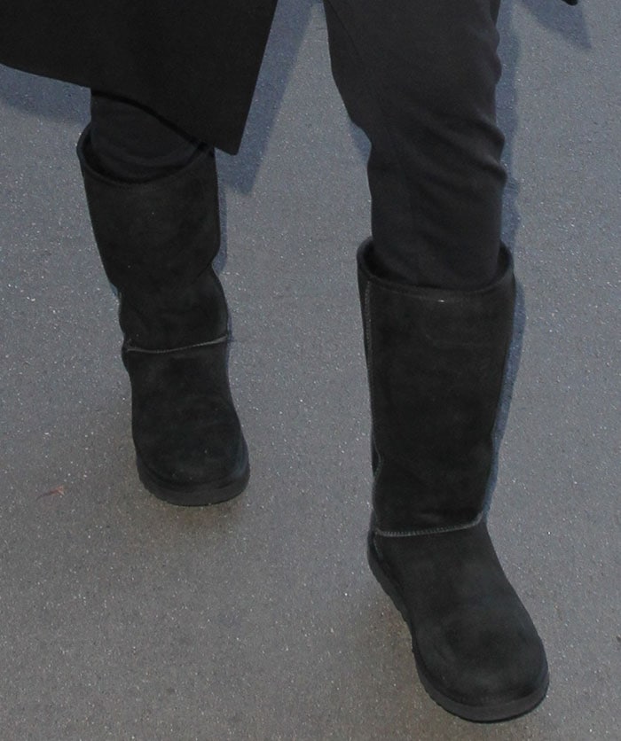 Ciara's black sheepskin boots