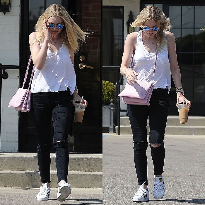 Dakota Fanning wears white sneakers with tank-top-and-jeans