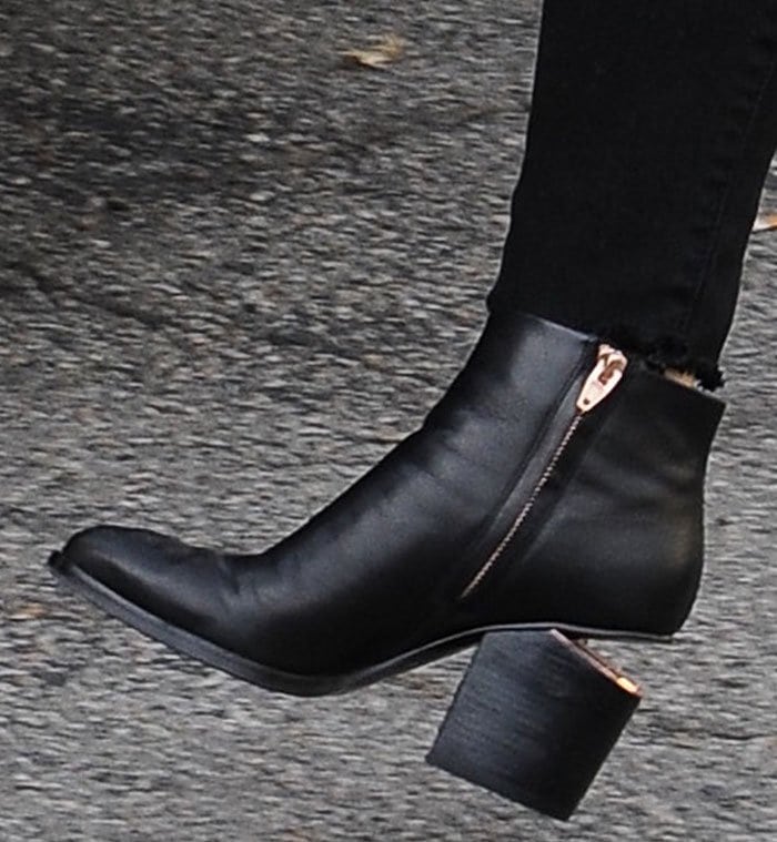 Demi Lovato's feet in black leather Alexander Wang boots