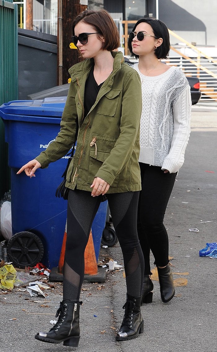 Lily Collins and Demi Lovato wear neutral colors and boots as they leave a lunch date in Los Angeles