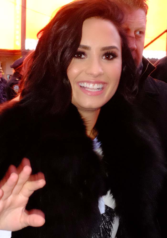 Demi Lovato wears her hair down at the New York Times Square for the annual "Dick Clark's New Year's Rockin' Eve" celebration