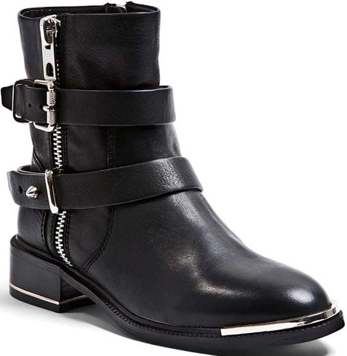 Hits of metal complement the edgy look of these Dolce Vita moto booties