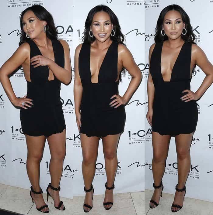 Dorothy Wang showcases her toned legs and plunging neckline in a daring black Anthony Vaccarello mini dress paired with ankle-strap stiletto sandals at her 28th birthday celebration at 1 OAK nightclub inside the Mirage Hotel & Casino in Las Vegas on January 29, 2016