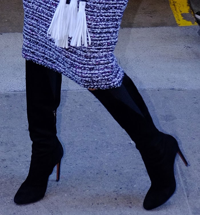 Eva Longoria in black suede knee-high boots