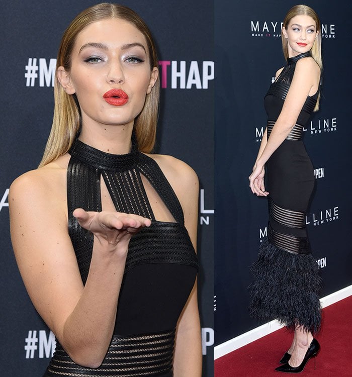 Gigi Hadid blows a kiss from the red carpet