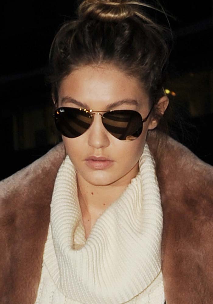 Gigi Hadid steps out in Paris, rocking chic aviator sunglasses and a cozy oversized sweater