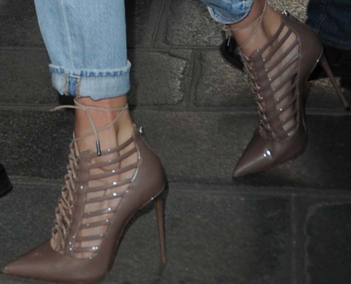 Gigi Hadid’s heels are striking pointed-toe stilettos with a high, slim heel