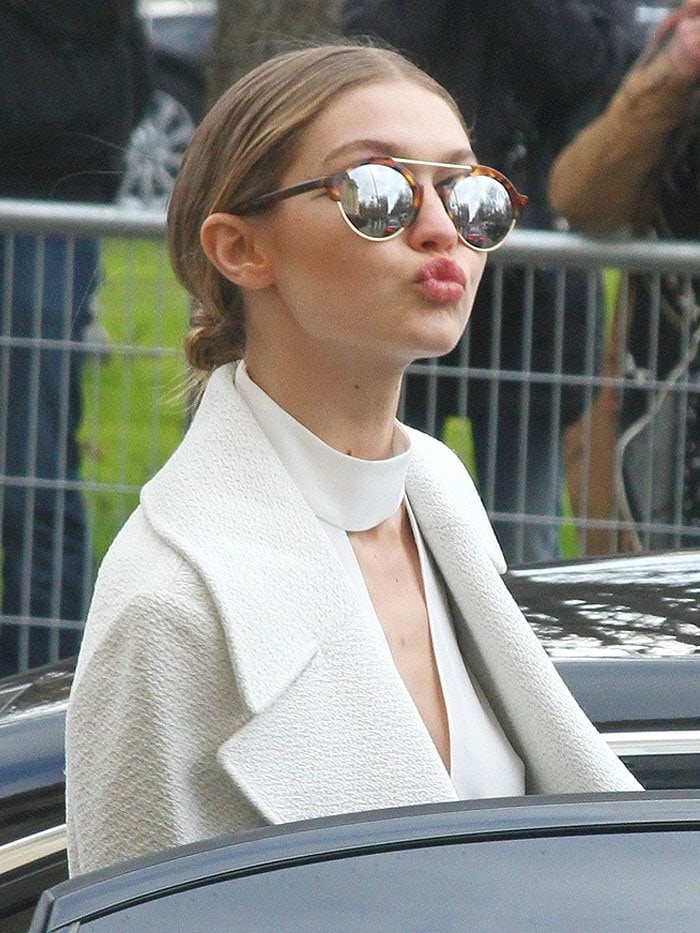 Gigi Hadid makes a kissy face to the waiting paparazzi