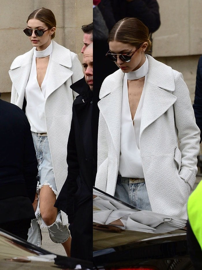 Gigi Hadid hides her eyes behind Illesteva sunglasses as she leaves the Chanel haute couture spring/summer 2016 fashion presentation