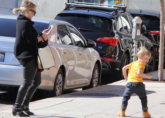 Hilary Duff takes a photo of her son Luca while the two have a play date