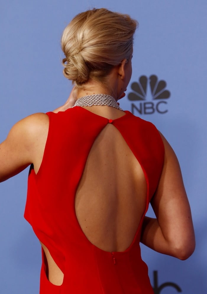 Jennifer Lawrence's red Christian Dior sleeveless dress with cutout detail