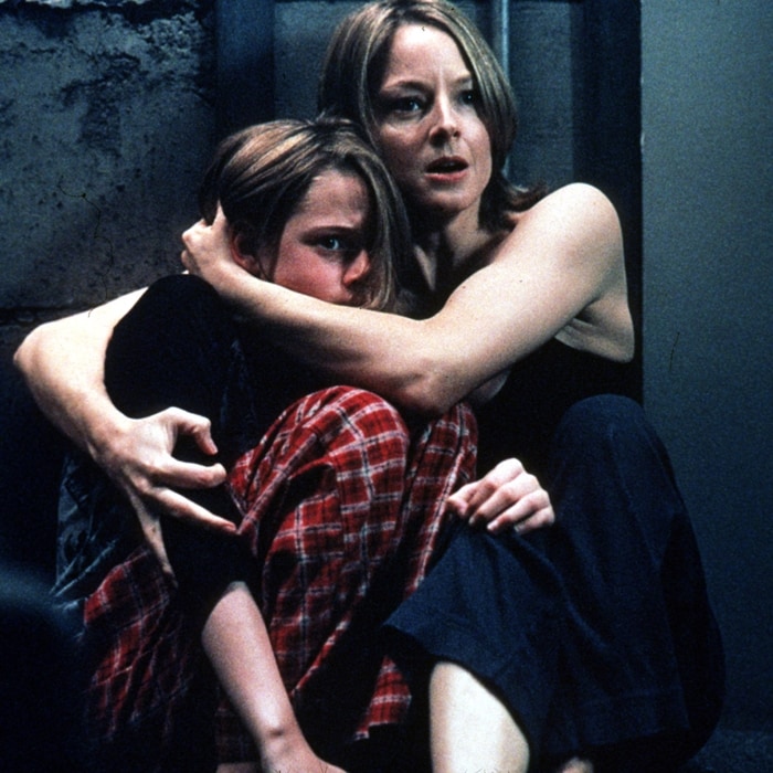 Jodie Foster and Kristen Stewart share a tense moment as mother and daughter in the 2002 thriller Panic Room