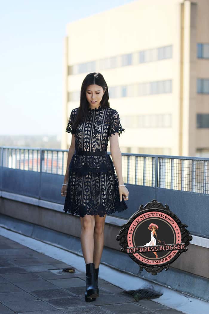 Jody teams a feminine lace dress with a pair of tough-chic black ankle boots