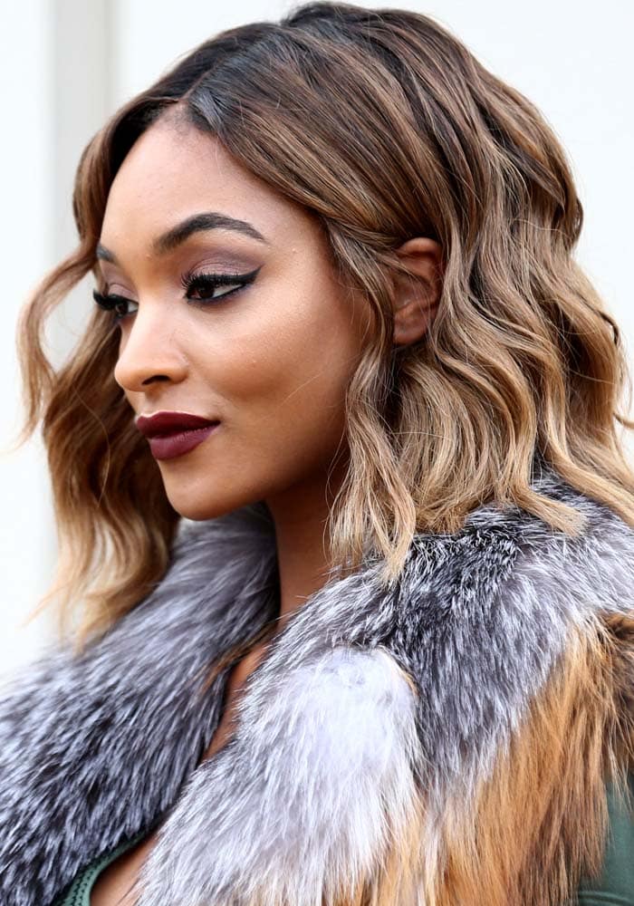 Jourdan Dunn kept warm in a chic fur coat by Burberry