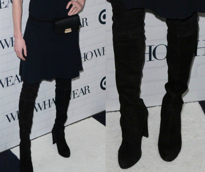 Kate Bosworth completes her ensemble with a pair of black suede Stuart Weitzman boots