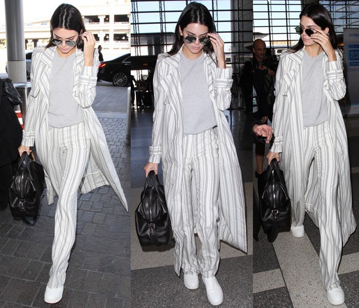 Kendall Jenner wears a $5,000-plus ensemble containing pieces from Sally LaPointe as she arrives at LAX