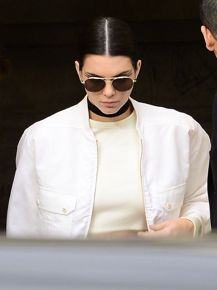 Kendall Jenner exits the venue for the Chanel haute couture spring/summer 2016 fashion show