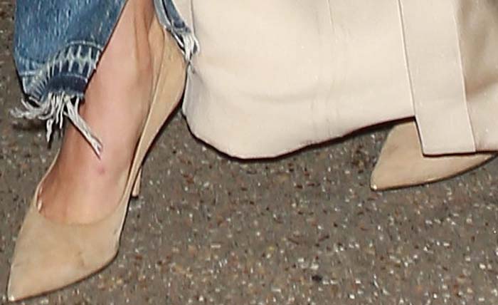 Kendall Jenner pairs chic nude Givenchy pointed-toe heels with frayed-hem jeans