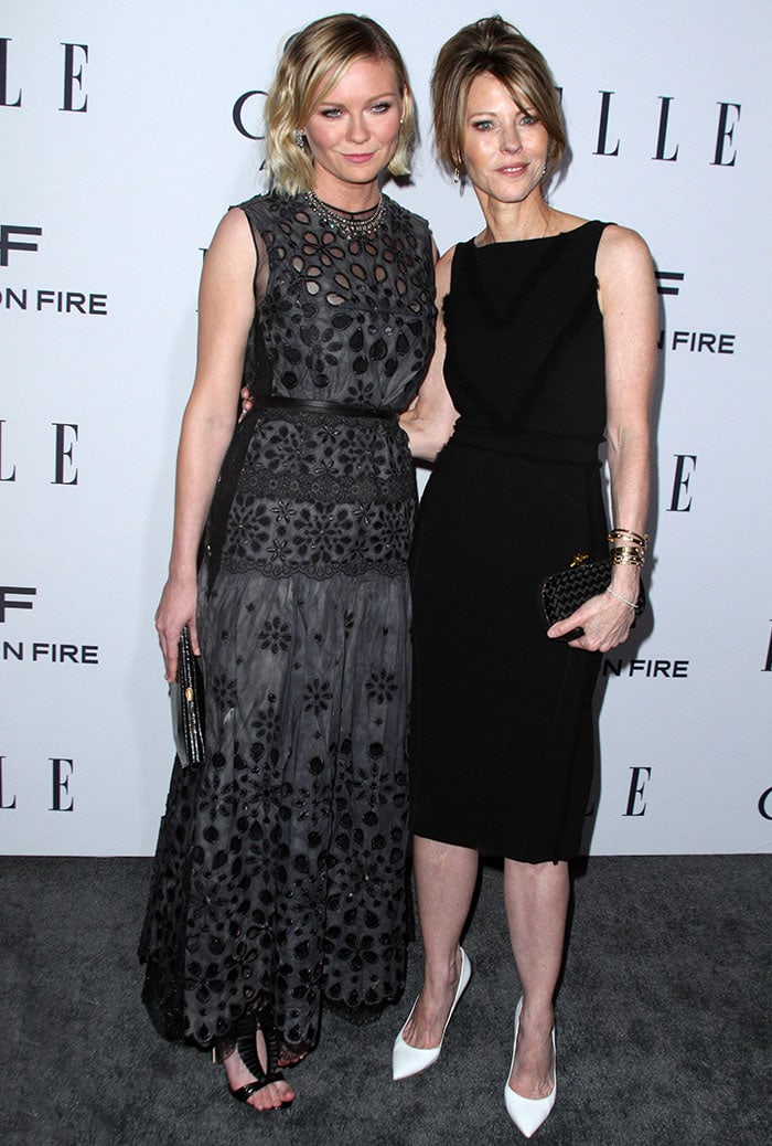 Kirsten Dunst and Elle Editor-in-Chief Robbie Myers pose for photos at Elle's Women in Television celebration